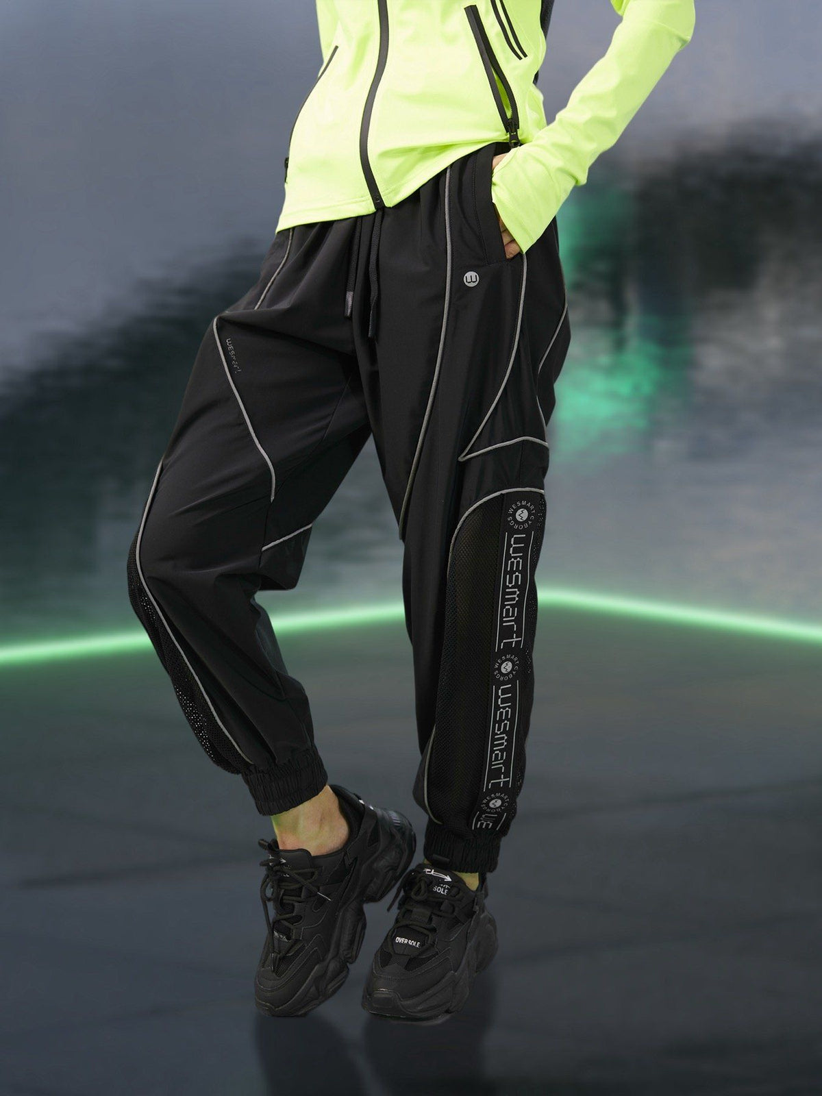 WESMART: Cyberpuck Striped Reflective Track Pants clottech