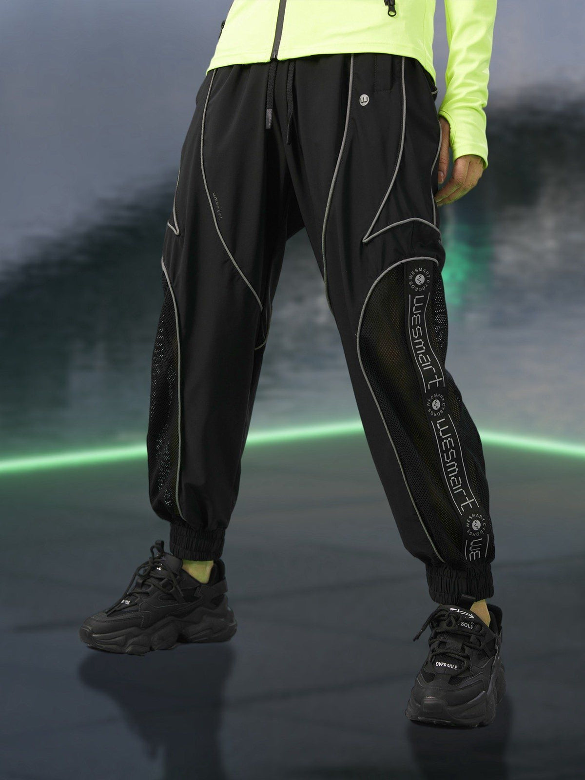 WESMART: Cyberpuck Striped Reflective Track Pants clottech